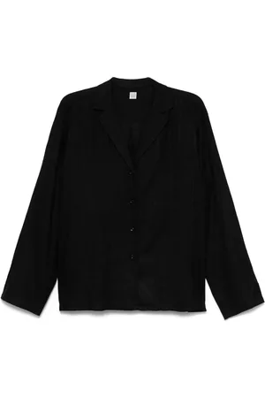 Totême Poloshirt met monogram