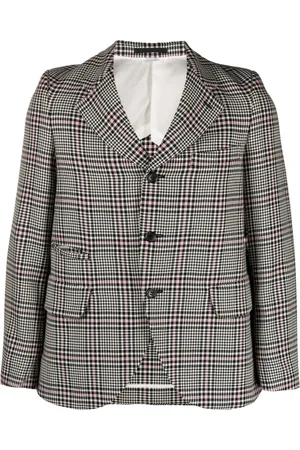 Comme des Garçons Blazer met pied
