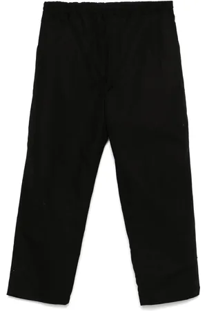 Comme des Garçons Broek met toelopende pijpen