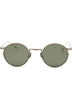 Eyevan 7285 Zonnebril met rond montuur