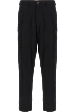 Comme des Garçons Broek met gekreukt effect