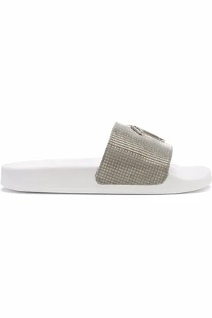 Giuseppe Zanotti Brett slippers met metallic afwerking