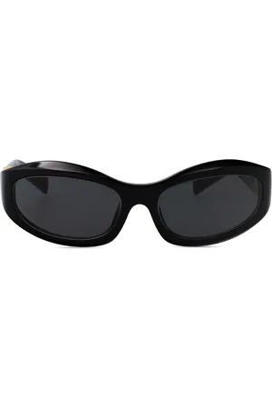 Miu Miu Zonnebril met schild montuur