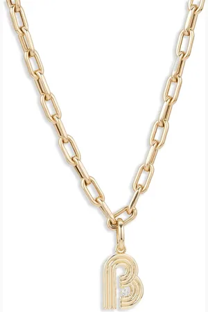 Adina Reyter 14kt geelgouden Initial hanger met diamant