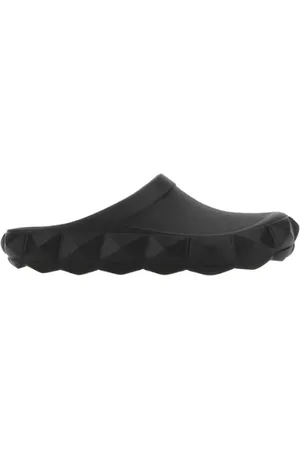 VALENTINO GARAVANI Black Rubber Roman Stud Turtle Slippers in