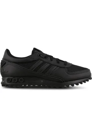 adidas LA Trainer Unisex Schoenen - Zwart - Maat: 36 - Leer - Foot Locker
