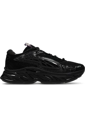 PUMA Exotek Heren Schoenen - Zwart - Maat: 41 - Mesh/Synthetisch - Foot Locker