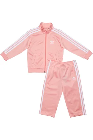adidas Firebird Unisex Trainingspakken - Roze - Maat: 63 - 68 CM - Poly Tricot - Foot Locker