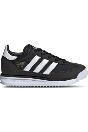adidas RS Unisex Schoenen - Zwart - Maat: 33 - Suède - Foot Locker