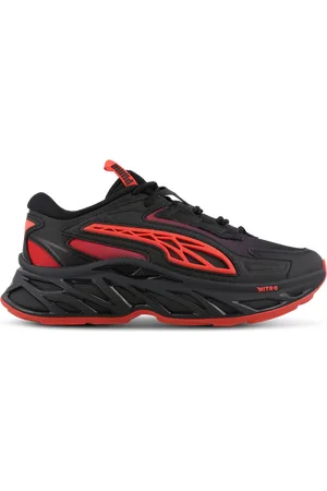 PUMA Exotek Unisex Schoenen - Zwart - Maat: 36 - Mesh/Synthetisch - Foot Locker