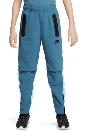 Nike Tech Woven Unisex Broeken - Blauw - Maat: 122 - 128 CM - Foot Locker