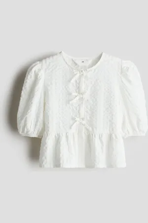 H&M Peplumblouse van katoenen seersucker