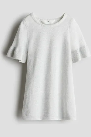 H&M Glanzende gebreide jurk