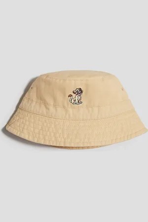 H&M Katoenen buckethat met borduursel