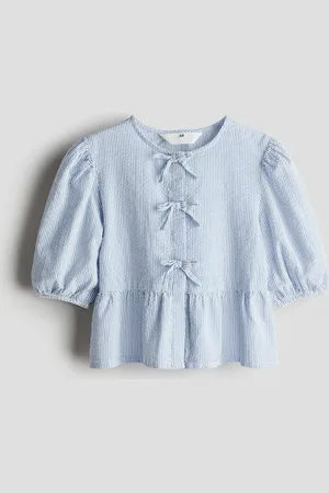 H&M Peplumblouse van katoenen seersucker