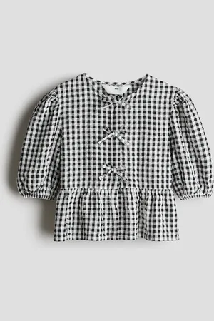H&M Peplumblouse van katoenen seersucker
