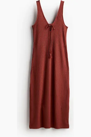H&M Ribgebreide jurk met strikbandjes