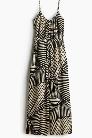 H&M Jumpsuit met strikceintuur