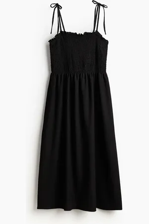 H&M Gesmokte jurk met strikbandjes