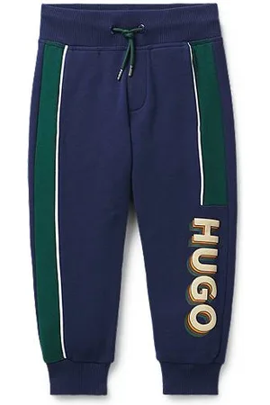 HUGO BOSS Trainingsbroek voor kinderen van een katoenmix met biezen en logo
