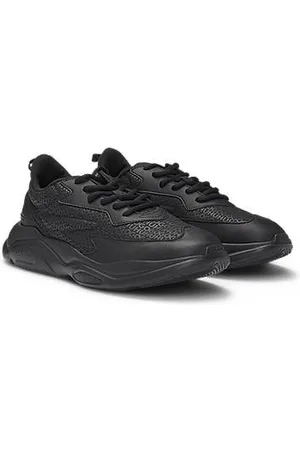 HUGO BOSS Sneakers van verschillende materialen met monogrammen bovenop en EVA-buitenzool