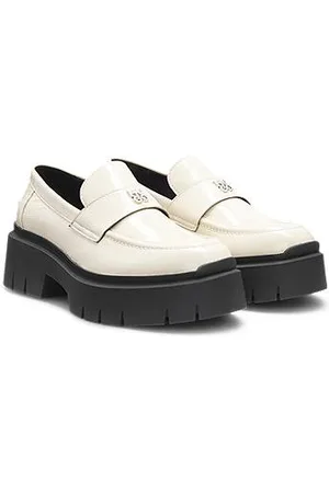 HUGO BOSS Loafers van leer met robuuste zool en tweedelig logodetail