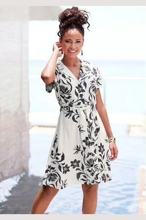 Lascana Jurk met overhemdkraag van linnenmix, luchtige zomerjurk met bloemenprint, strandjurk (Met een bindceintuur)