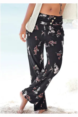 Lascana Strandbroek met zakken en sierknopen, jersey broek, elastisch