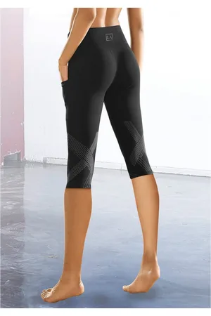 Lascana Caprilegging met optisch reflecterende print en tasje voor de mobiele telefoon