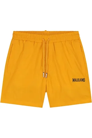 Malelions Men Iconic Swim Shorts | Light Orange/Black