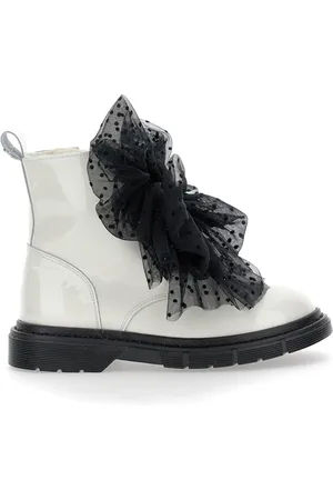 MONNALISA Sheepskin and leather combat boots with bows