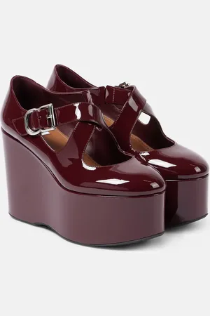Alaïa Criss Cross patent leather wedges
