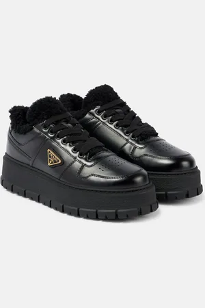Prada Shearling-lined leather platform sneakers
