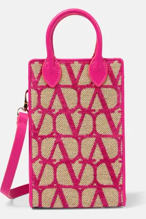 VALENTINO GARAVANI Toile Iconographe leather-trimmed crossbody bag