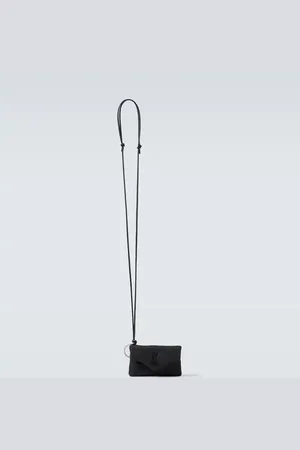 Saint Laurent Cassandre Mini leather-trimmed crossbody bag