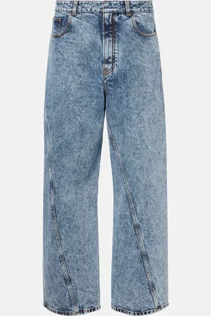 Alaïa Twisted low-rise wide-leg jeans