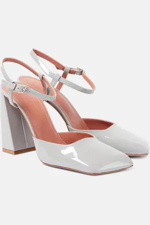 Amina Muaddi Charlotte patent leather slingback pumps