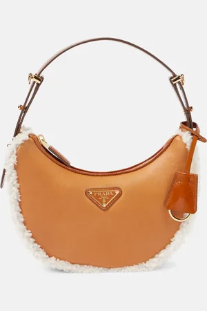 Prada ArquÃ© Small shearling-trimmed leather shoulder bag