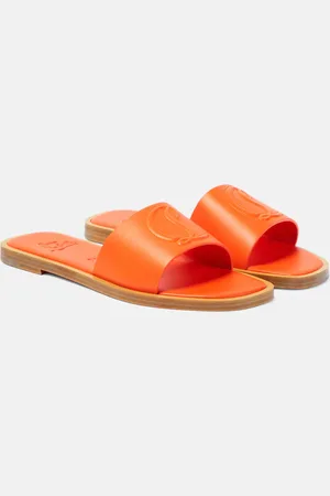 Christian Louboutin CL embossed leather mules