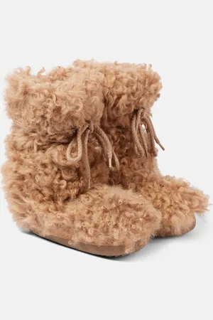 INUIKII Long Curly High shearling snow boots