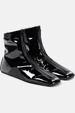Alaïa Sneaker faux patent leather ankle boots