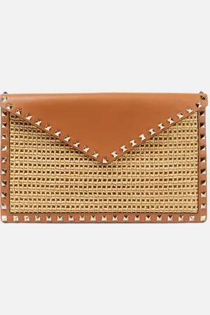 VALENTINO GARAVANI Rockstud Large leather-trimmed raffia clutch