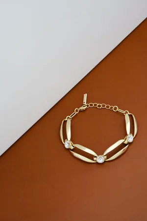 Karen Millen Gold Tone Crystal Ellipse BraceletEén