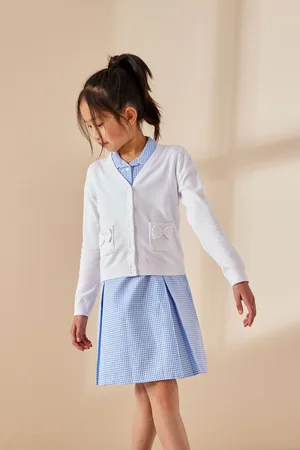 Next Schoolvest met zakken van katoenrijk materiaal (3-16 jr)134140cm