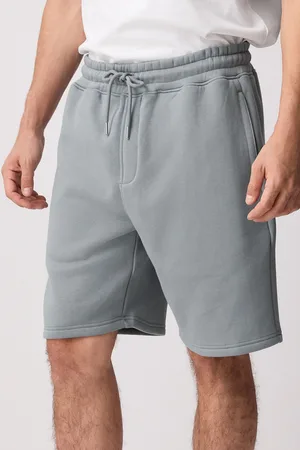 Next Geborstelde jersey shorts met ritszakkenSmall