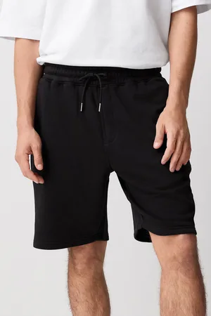 Next Geborstelde jersey shorts met ritszakkenX-large