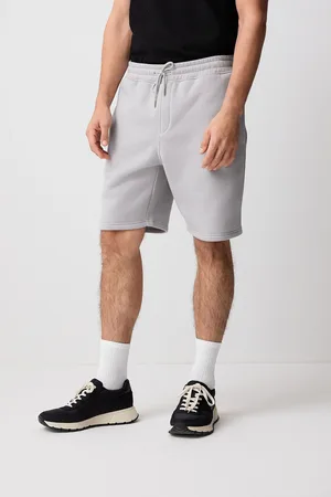 Next Geborstelde jersey shorts met ritszakkenX-large