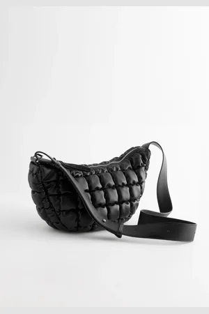 Next Padded Sling BagEén