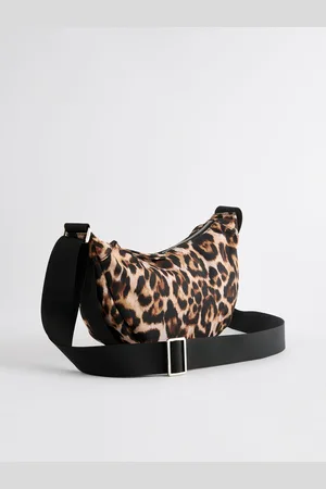 Next Crossbodytas met slingbandEén