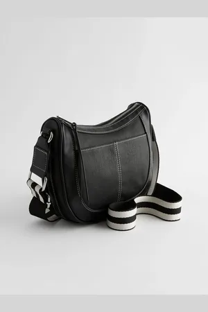 Next Cross-Body Saddle BagEén